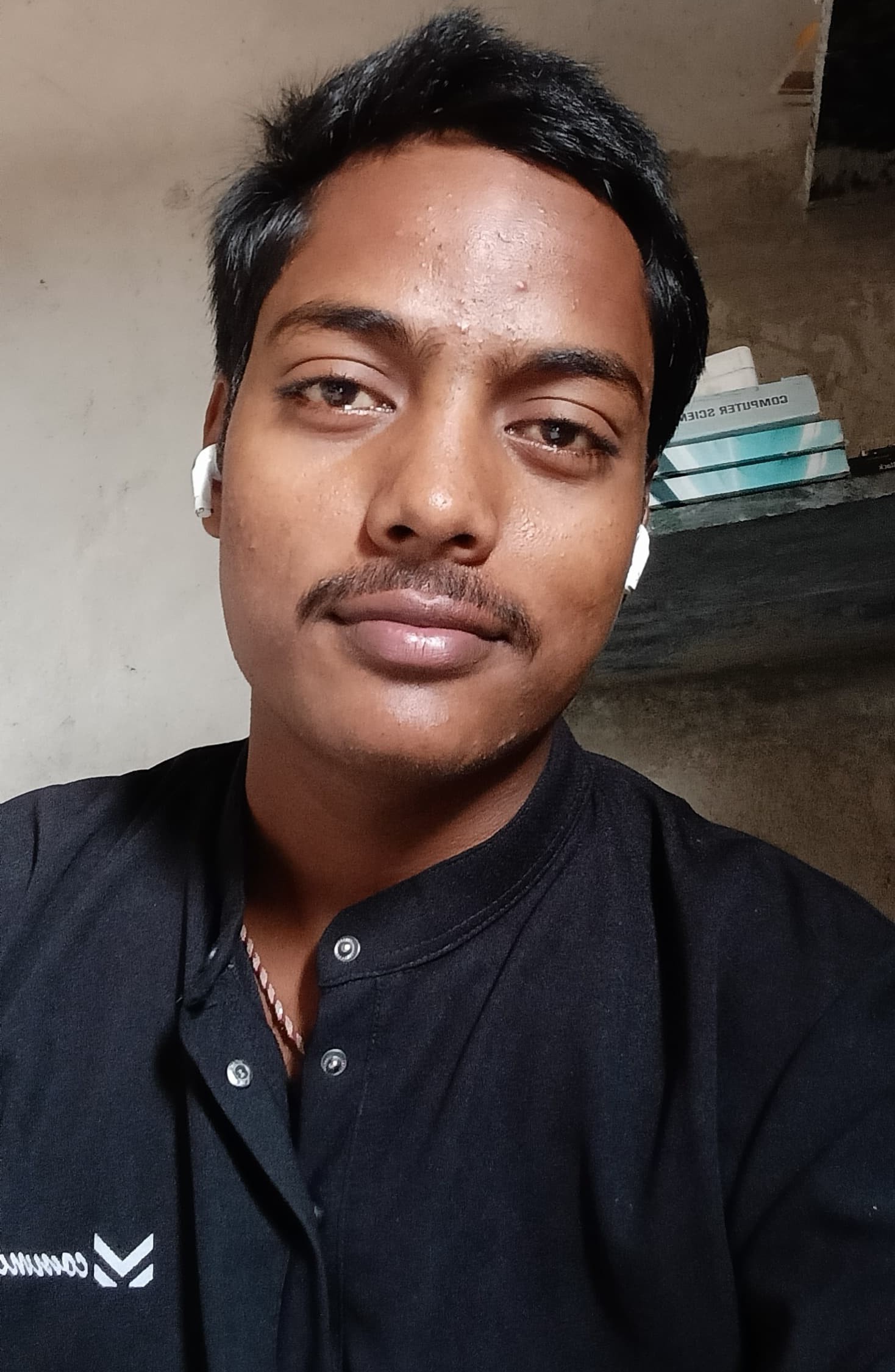 Portrait of Pravin Pandit, a professional in cybersecurity, smiling confidently
